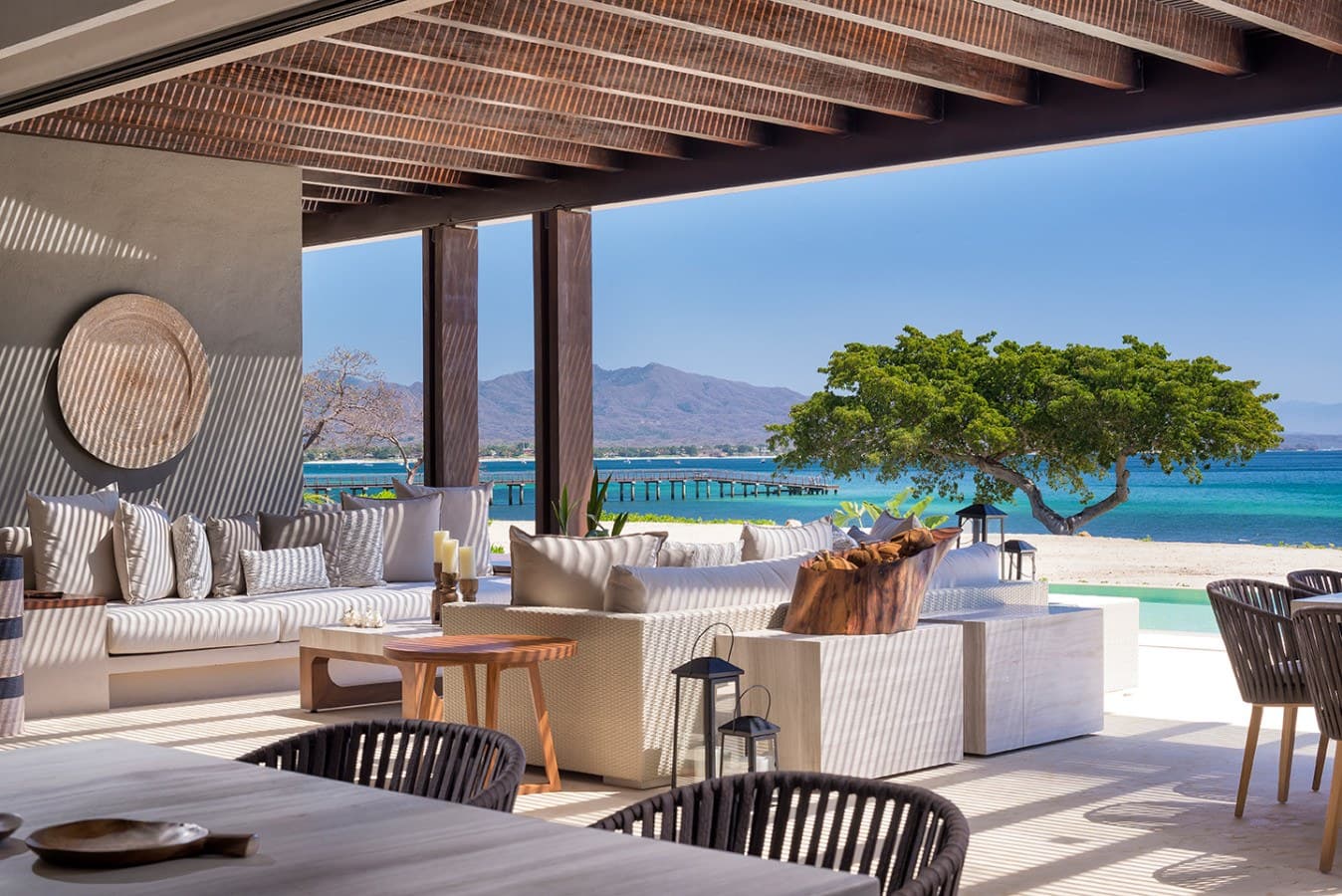 Relax in your private beachfront lounge, where soft ocean breezes and pristine turquoise waters create the perfect tropical escape just steps from your door.