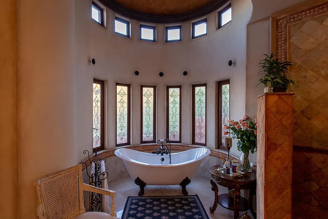 Bathroom 1 (Master ensuite) · A standing bathtub in one of the large bathrooms in the villa.