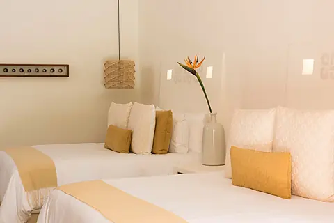 Sink into the crisp linens and let the soft textures and warm accents soothe you into complete relaxation.