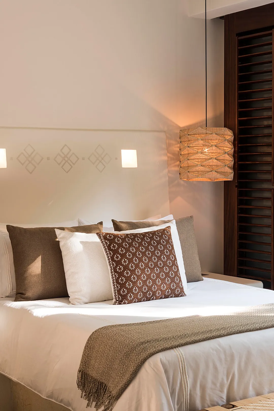 Bedroom 2 · Slip into crisp white linens and let your worries melt away. Warm lighting, textured accents, and a soothing neutral palette create your perfect retreat after a day of adventure.