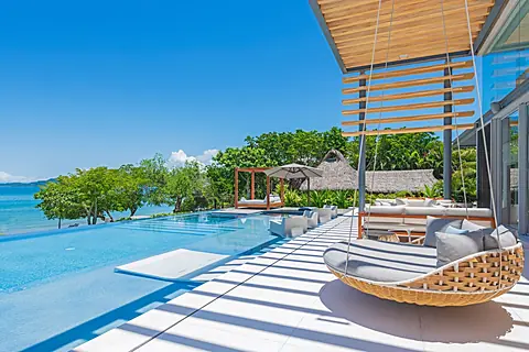Slip into these suspended loungers and soak up uninterrupted views of turquoise water merging with tropical greenery. Your infinity pool, your private oceanfront paradise—every day feels like an escape here.