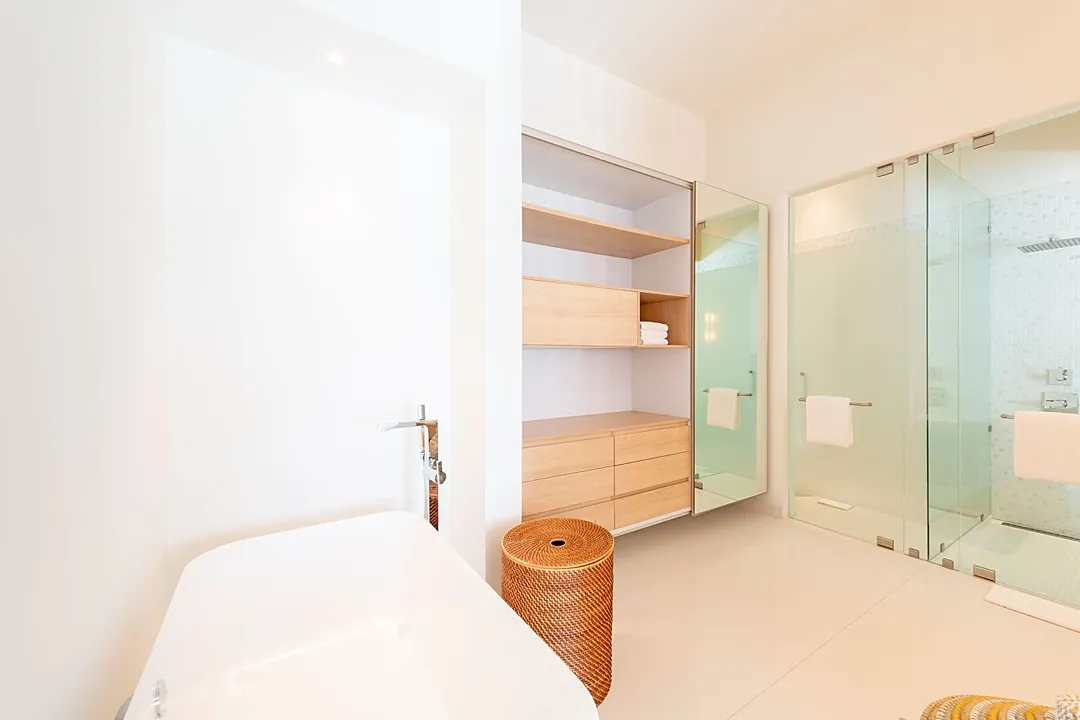Bathroom 3 · Soak away the day in your serene soaking tub, with a rainfall shower just steps away for a refreshing rinse.