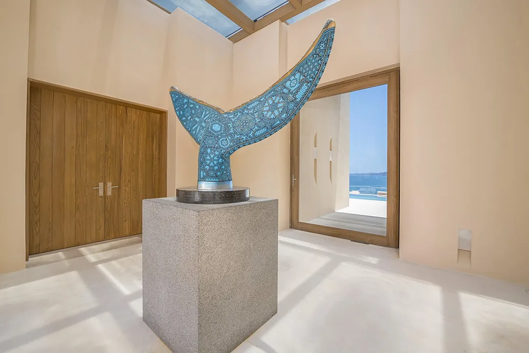 Bathroom 4 · Step into your serene ensuite with dual vanities, illuminated mirrors, and plenty of storage. Your private shower awaits through the glass door, while thoughtful touches like fresh towels and soft lighting create a spa-like retreat.