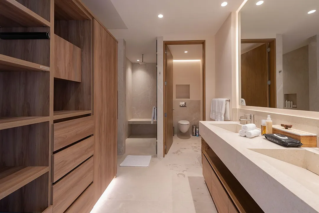 Bathroom 3 · Step into your sleek, modern bathroom where soft lighting and stone surfaces create a spa-like retreat after your adventures.