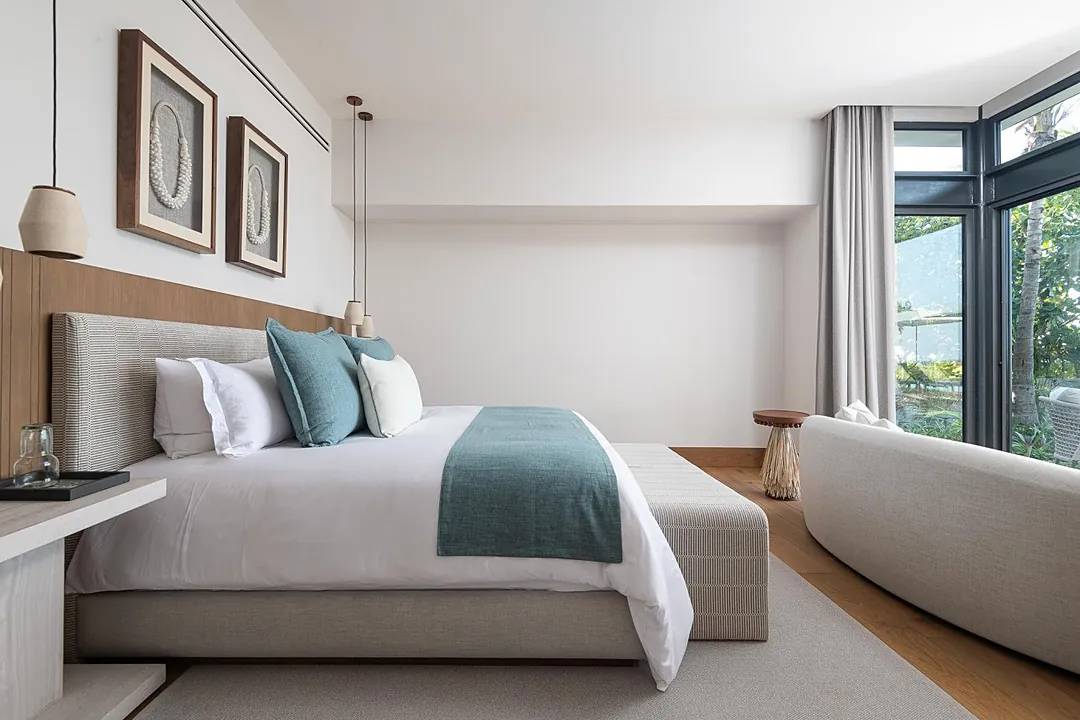 Bedroom 2 · Sink into crisp linens and plush pillows after a day of adventure. Your serene bedroom features modern touches, calming tones, and a peaceful view to help you unwind.