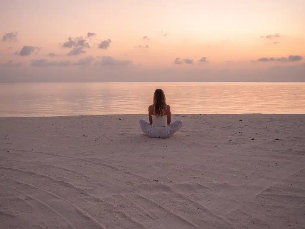 Meditating on the beach at sunset in Los Cabos
