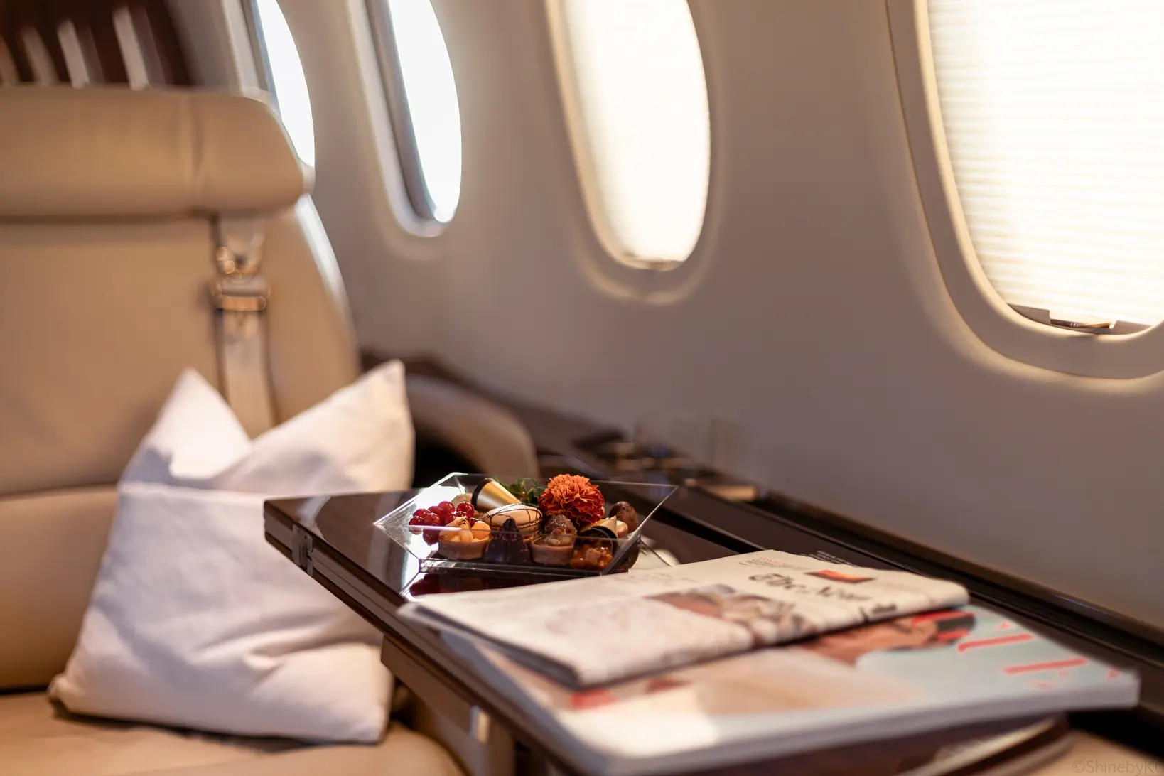 A gourmet meal and fine wine in the cabin aboard Aero
