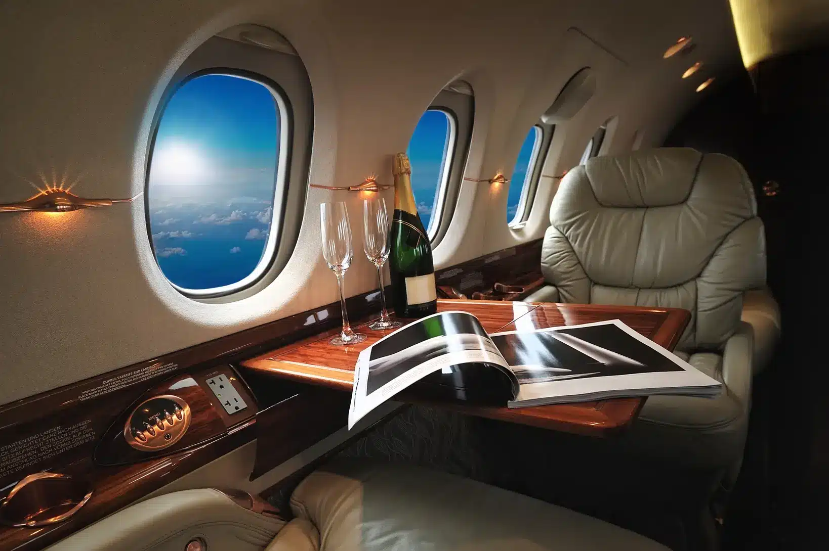 Oversized leather seats and cabin windows aboard Aero
