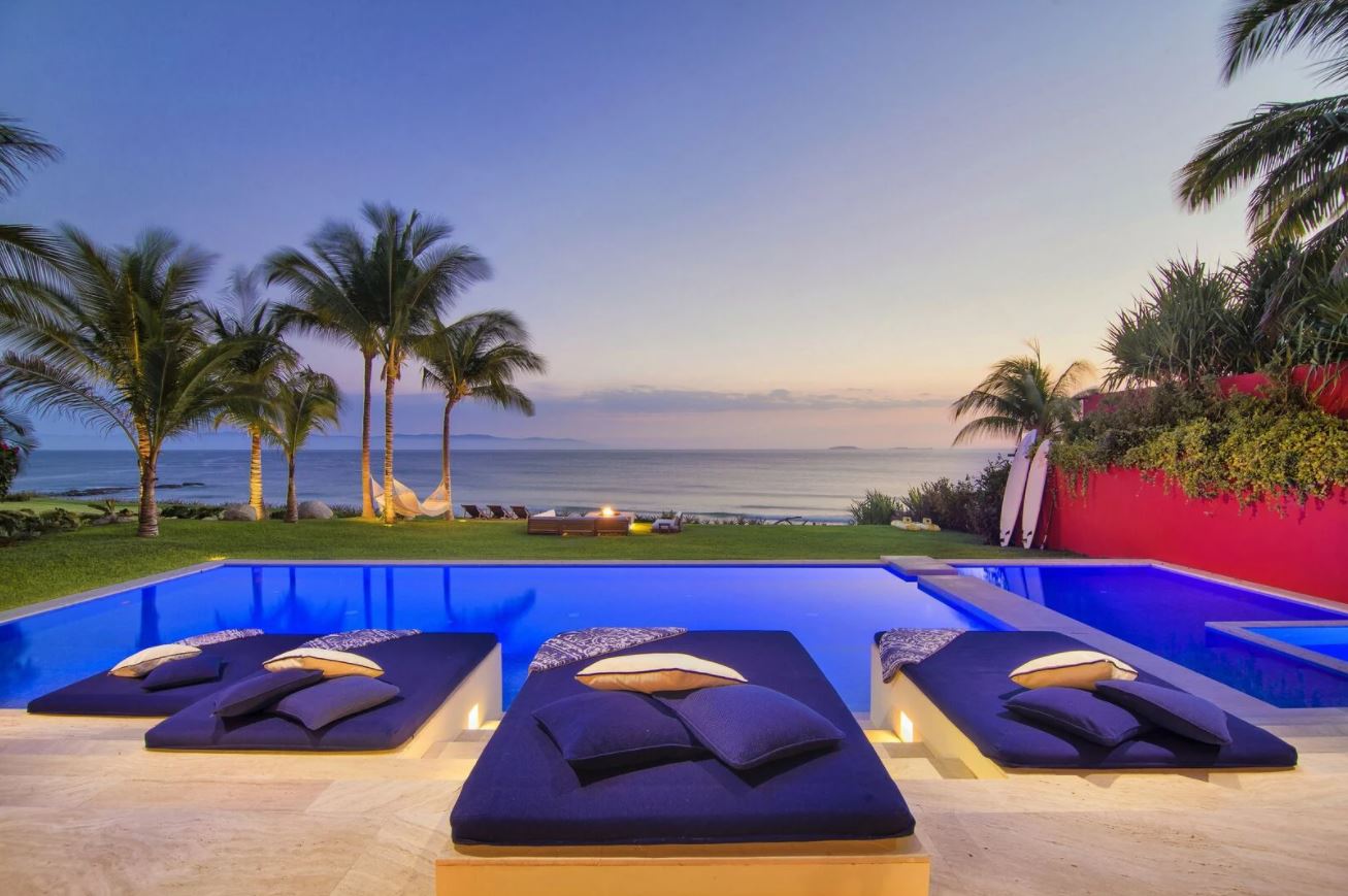 Poolside chairs at one of our Punta De Mita Rentals