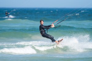 Man kiteboarding in the ocean