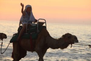 Woman on a camel ride
