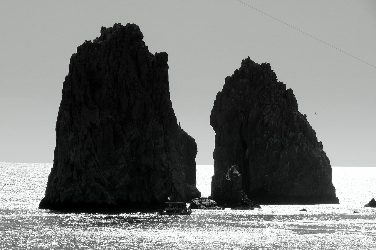 A black and white photo of coastal rocks around Cabo